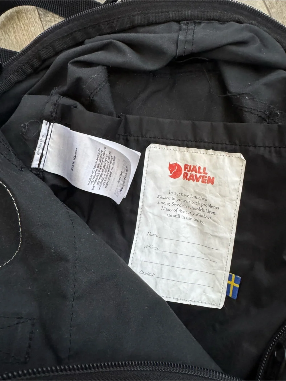 Fjallraven Kånken Black Backpack with Red Logo